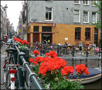 Bicycles, flowers and a canal in the Jordaan district of   Amsterdam